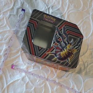 Pokemon Tin with Black, Gold, and Red Accents